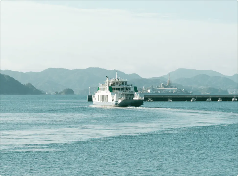 A white ferry bound for Okunoshima docked at Tadanoumi Port