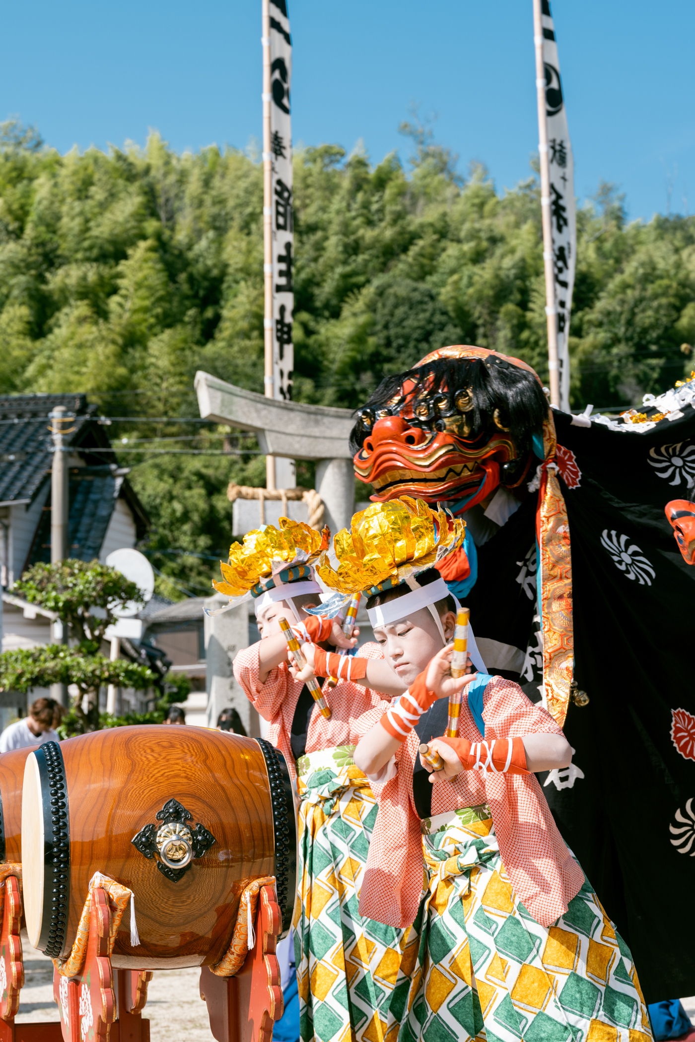 Drumbeats echo under the autumn sky as the lion dance brings the community together